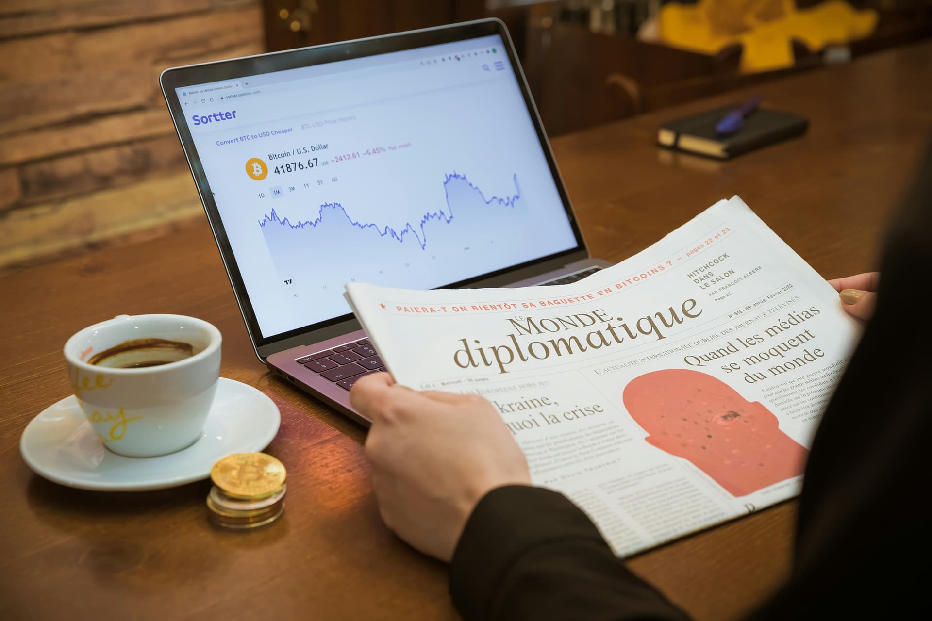 Financial leader reviewing reports on a tablet.